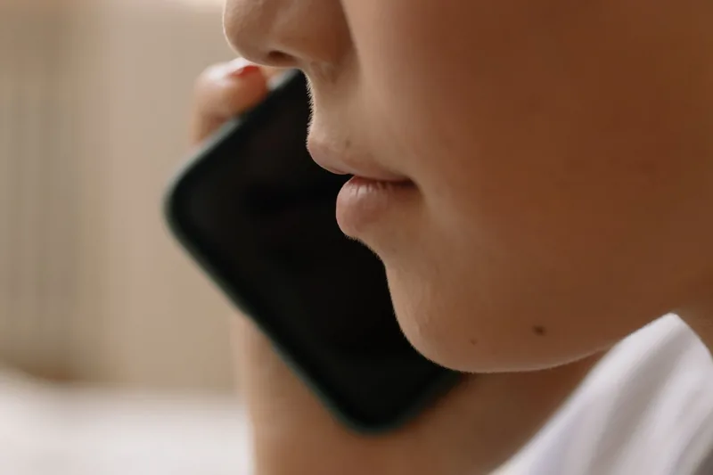 Someone using a mobile phone