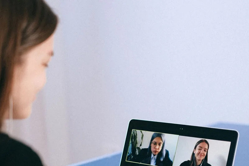 A video call open on a laptop